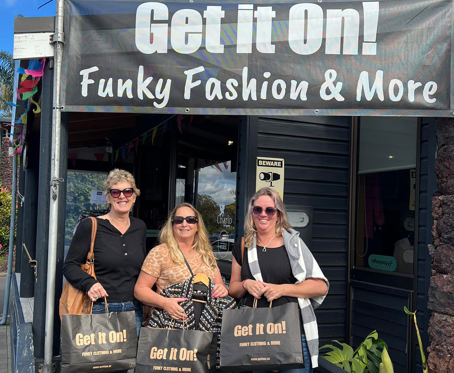 Happy Customers outside Get it on Fashion Store